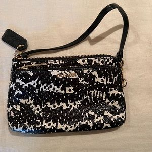 Black and White Coach wristlet. Brand new condition.